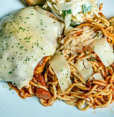Chicken parmesan with spaghetti in tomato sauce
